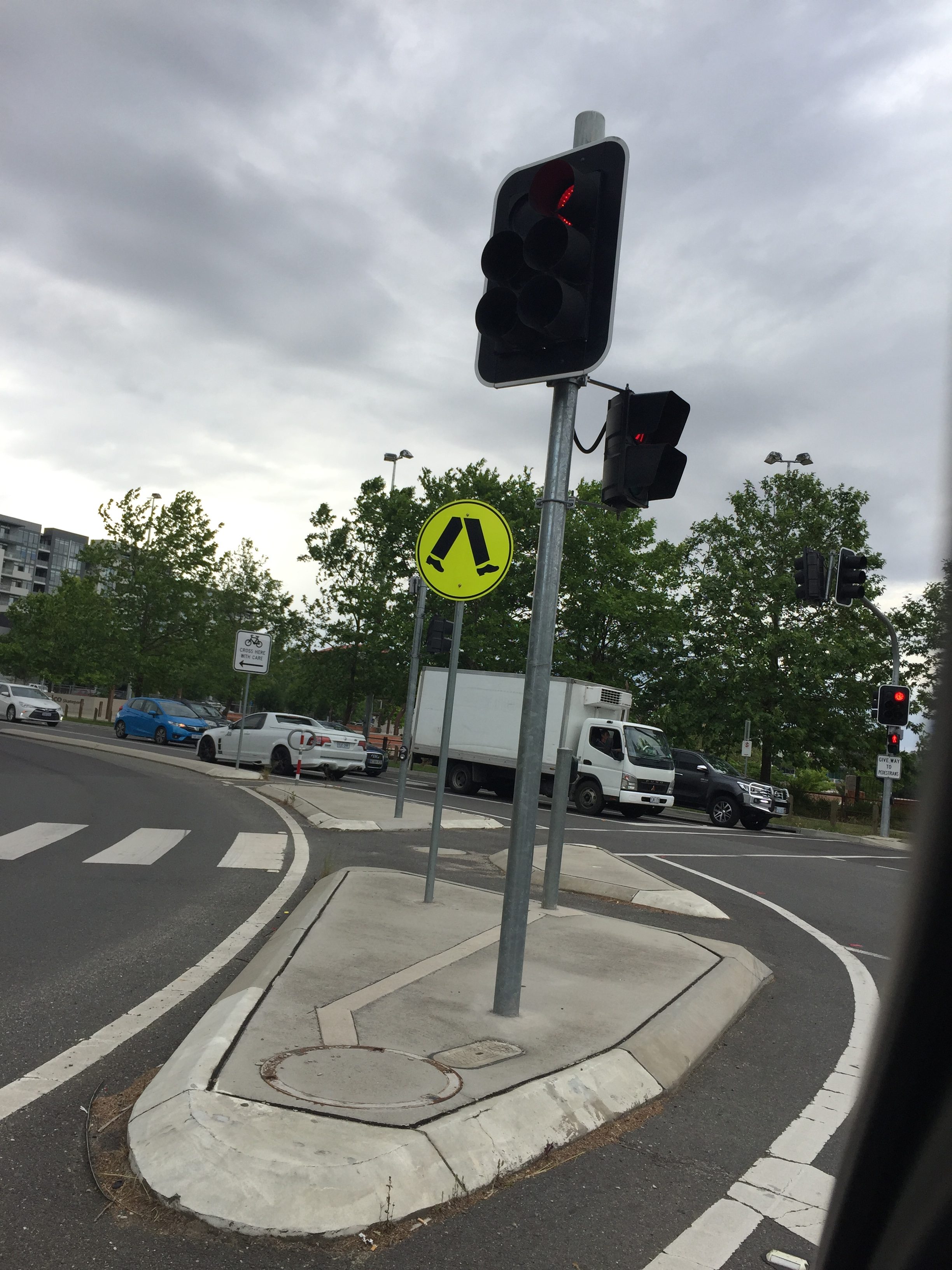 Australian pedestrian crossing sign of random legs