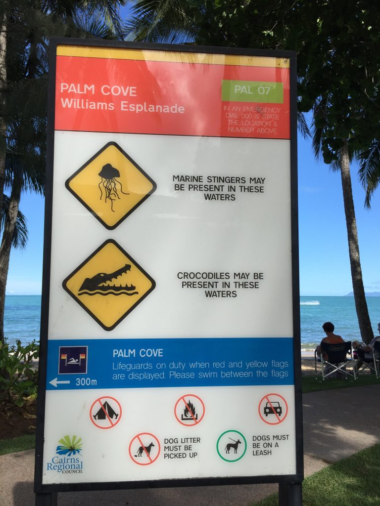 sign on the beach at Palm Cove