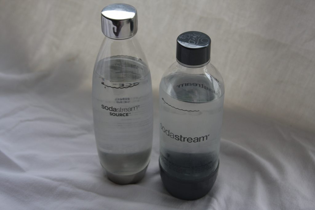 Two styles of SodaStream Water Bottles filled with water