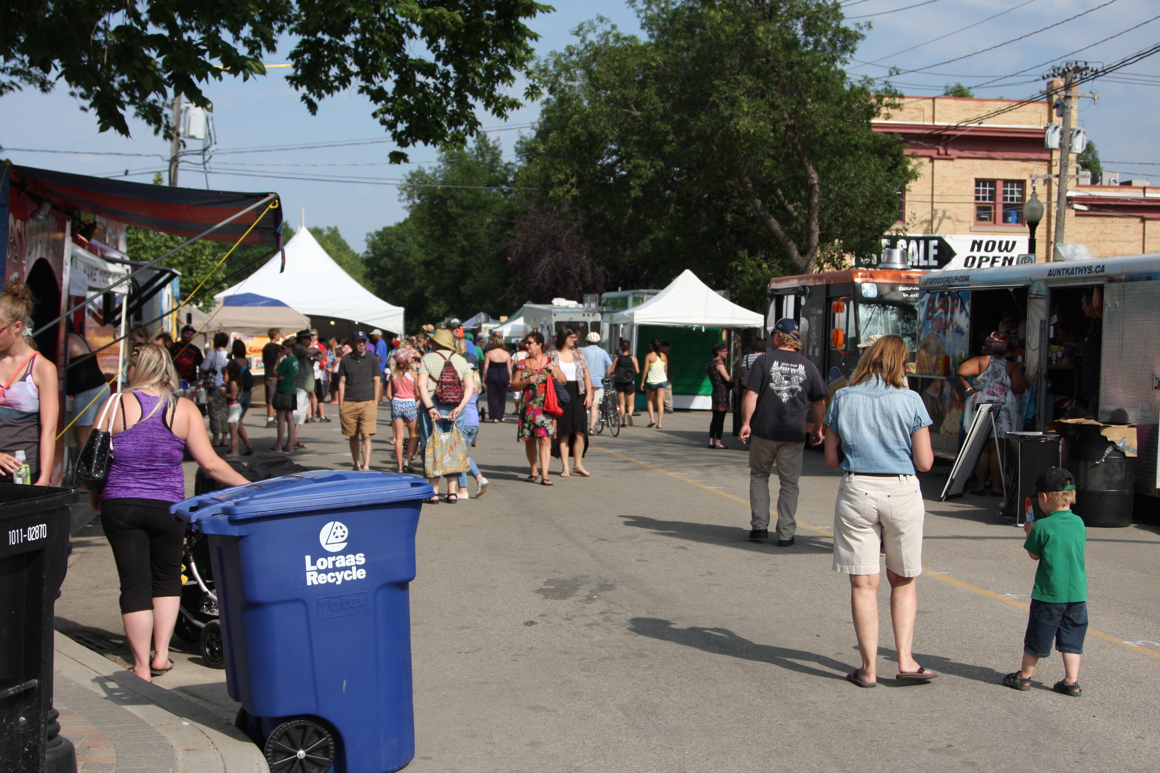 food tents and food trucks on the street for Fringe Fest in Saskatoon