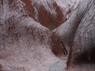 Uluru Waterfall into Watering Hole a tour from Alice Springs to Uluru