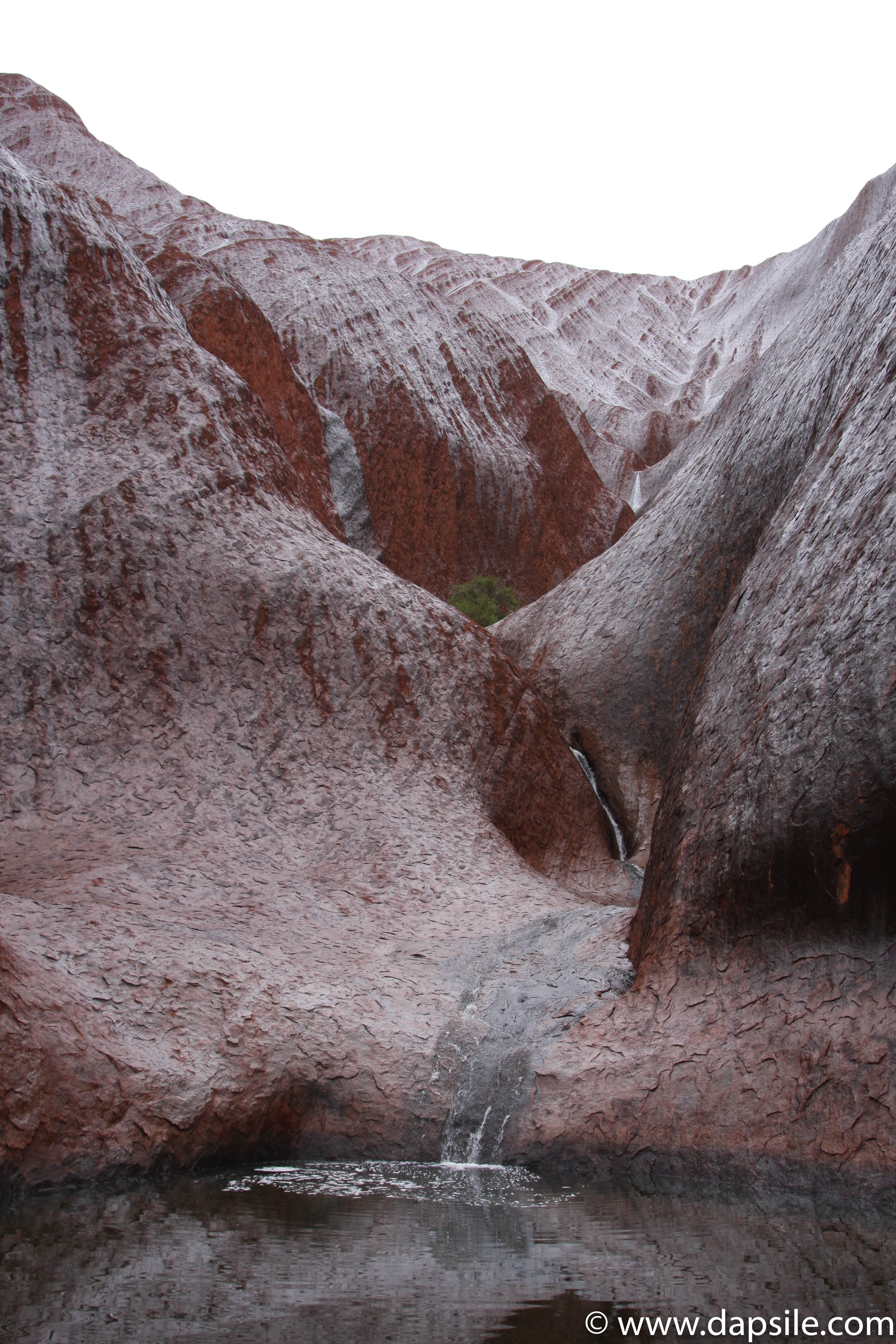 Uluru Waterfall into Watering Hole a tour from Alice Springs to Uluru