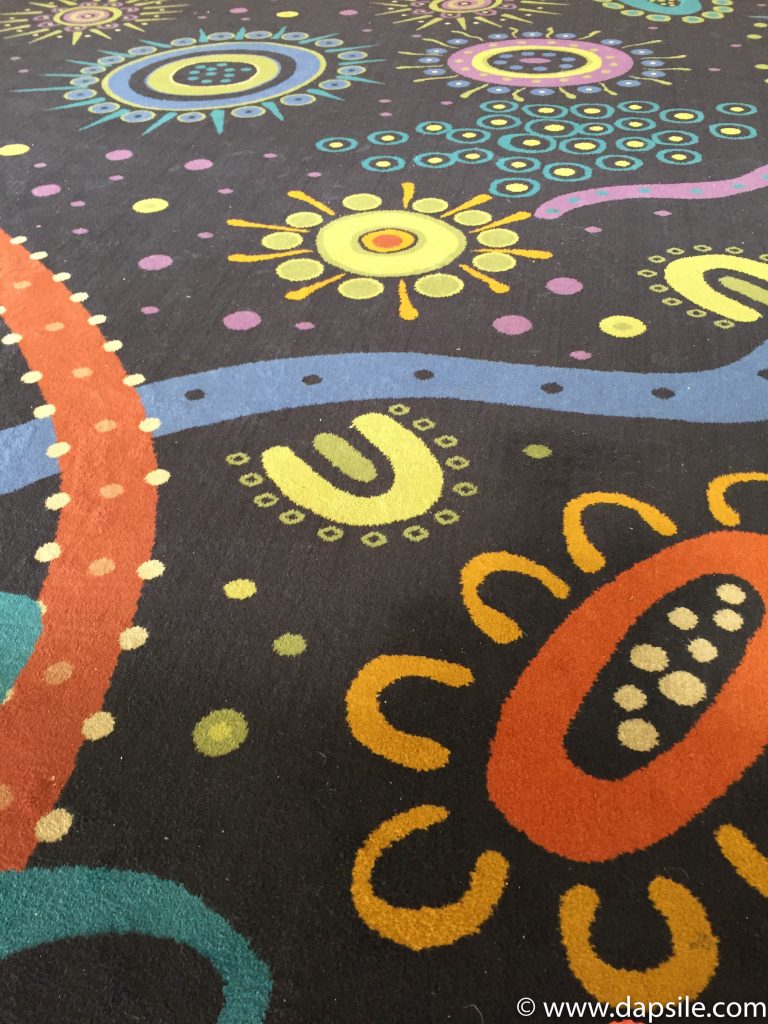 Indigenous Art Carpet Pattern in Alice Springs Airport while visiting the Alice Springs area