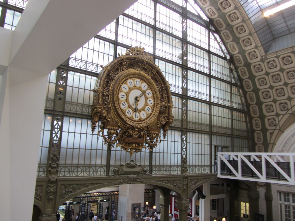 The Wall of Windows and Big Clock Looking Into the Main Hall at the Muse d'Orsay in Paris