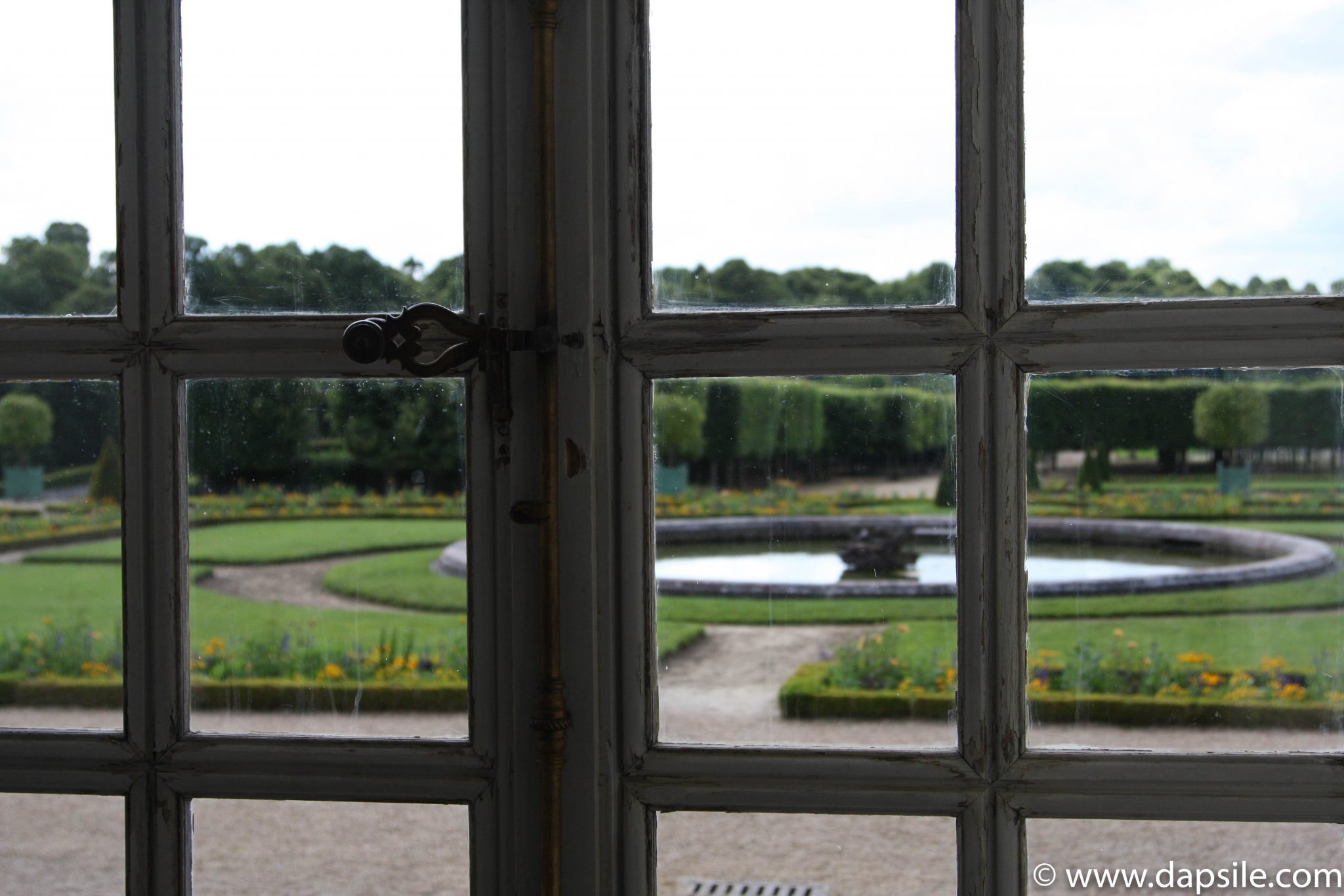 Palace of Versailles Garden through the Window in Paris Sights