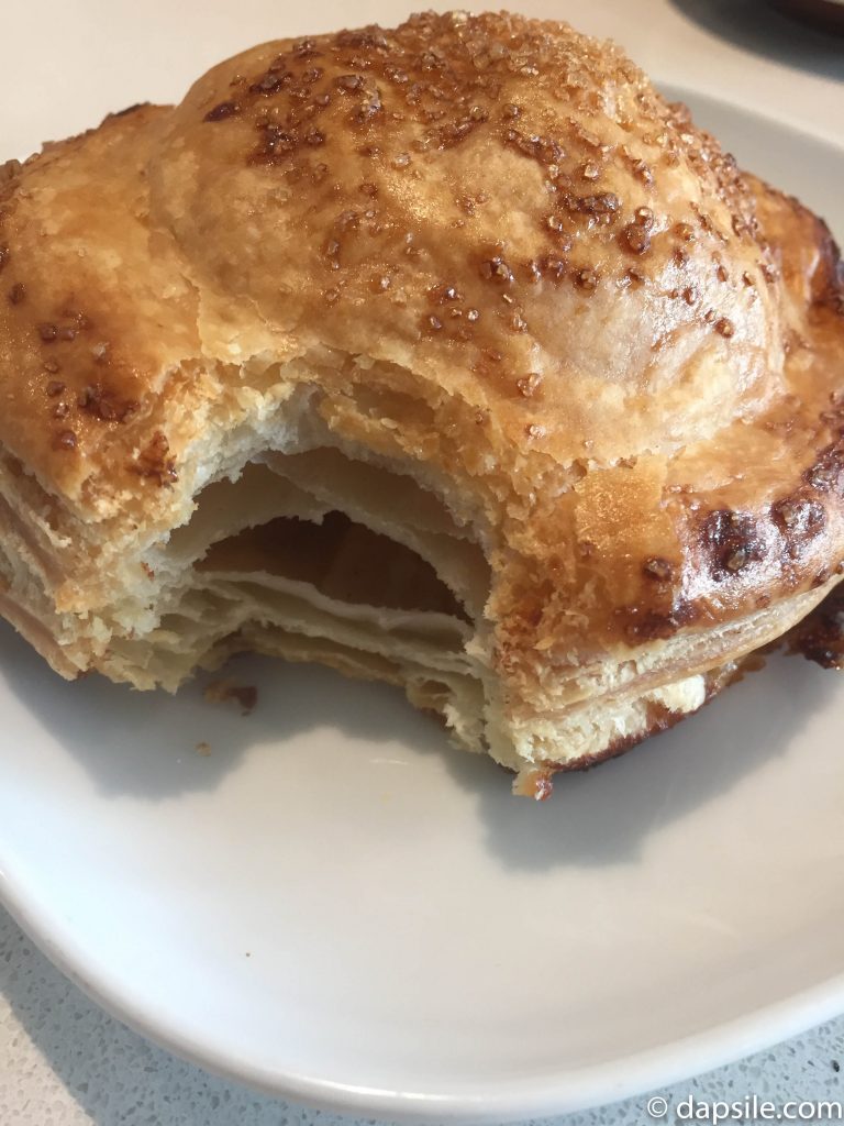 French style of the apple turnover inside with all the flaky pastry and apples