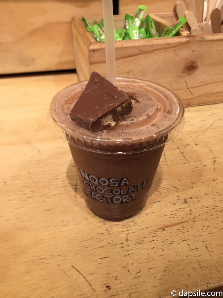 Noosa Chocolate Factory Iced Chocolate Drink served with a chunk of chocolate