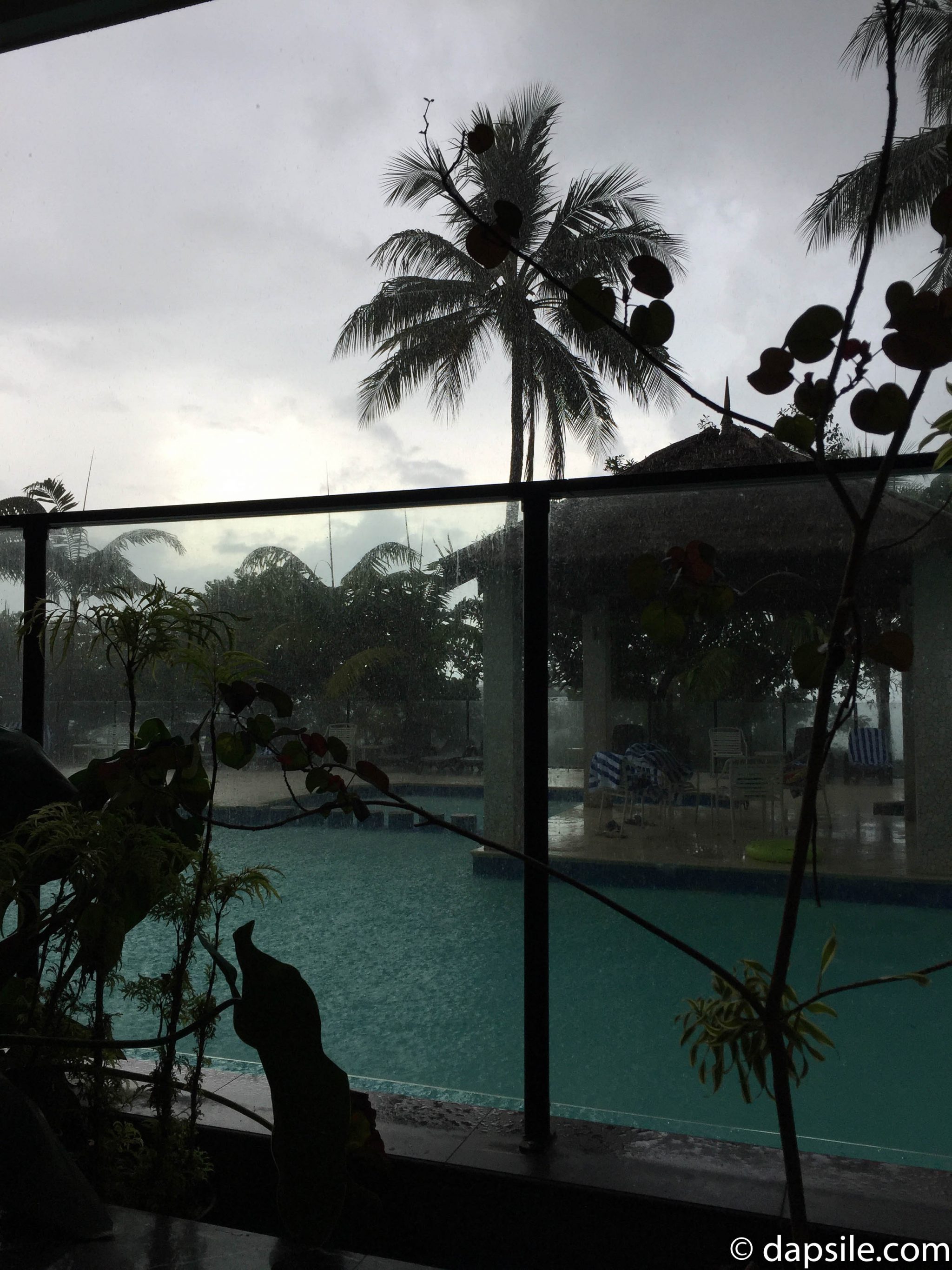 Watching the rain at the Pool at Fitzroy Island Resort