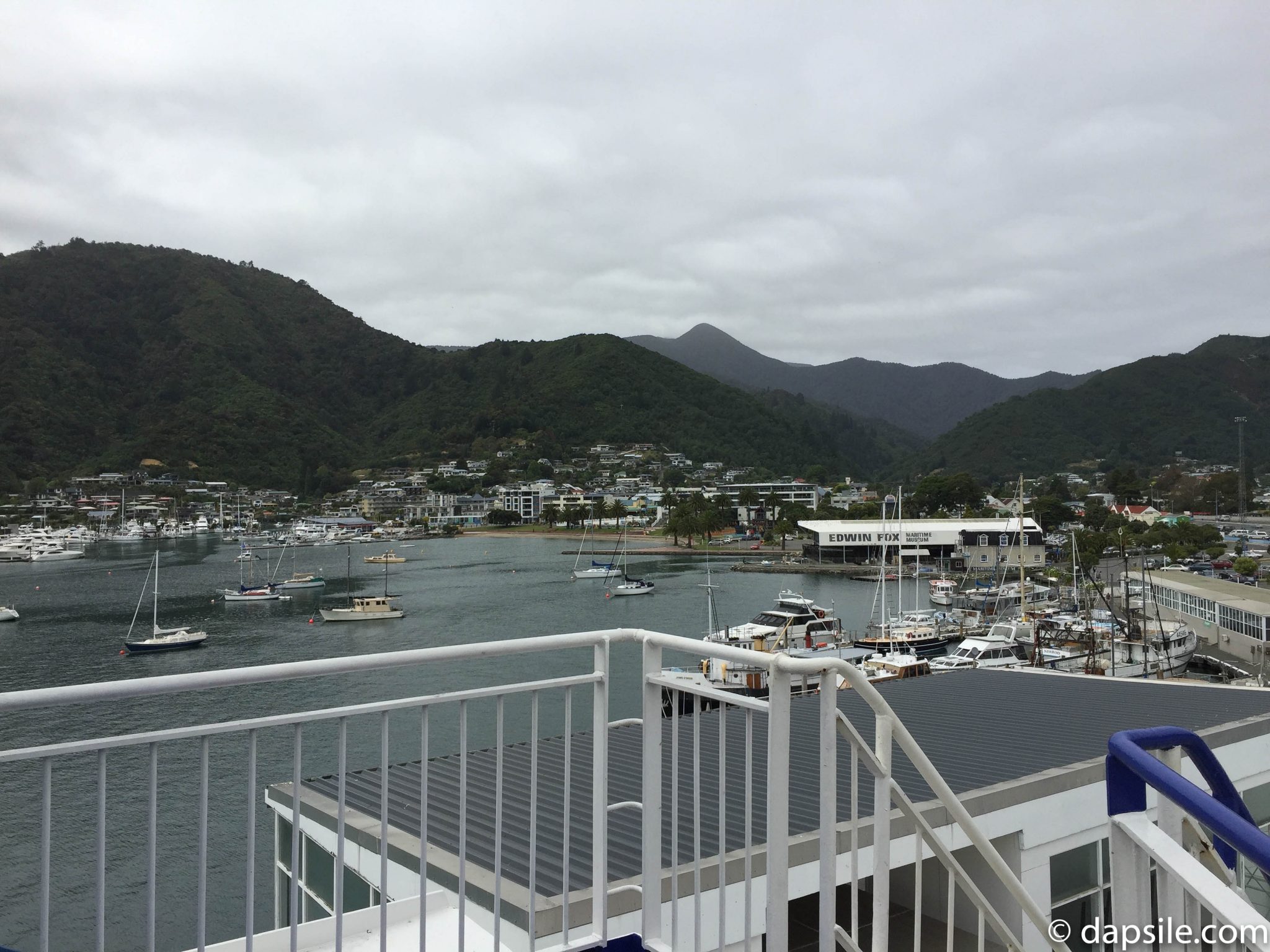view of Picton New Zealand, mountains, ocean, and boats in the water from the ferry