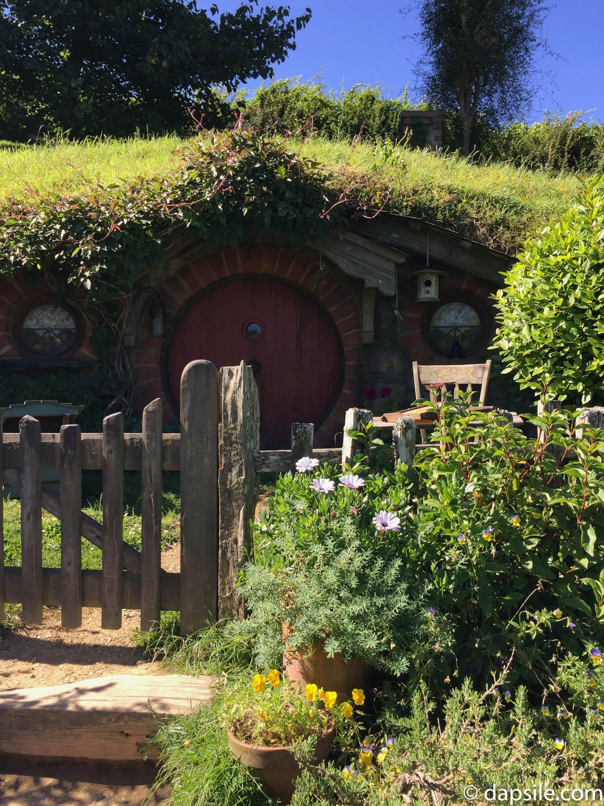 Hobbit Home with Red Door at Hobbiton on the drive from Wellington to Auckland