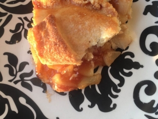 Tartine Caramel Apple Pie view of Tartine's Caramel Apple Pie from top on black and white plate